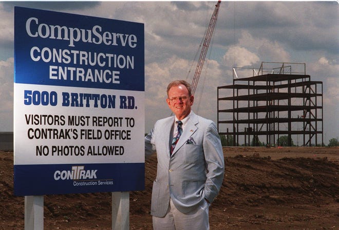 Hilliard Mayor Roger Reynolds stands in front of the construction entrance for the new CompuServe building on Britton Road in Hilliard.