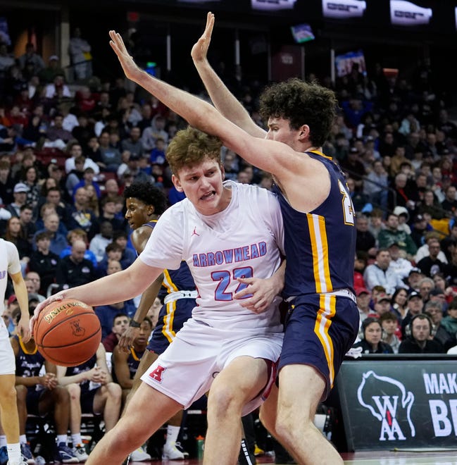 Marquette's Ryan Meehan (24) guards Arrowhead's Andy Cochrane (22) during the first half of the WIAA Division 1 boys basketball state championship game on Saturday March 16, 2024 at the Kohl Center in Madison, Wis.