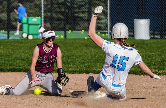 Brookfield Central's Norma Glisczinski (15) steals second as Menomonee Falls' Ellie Bruns (40) drops the ball in the game at Brookfield Central, Monday, April 15, 2024.