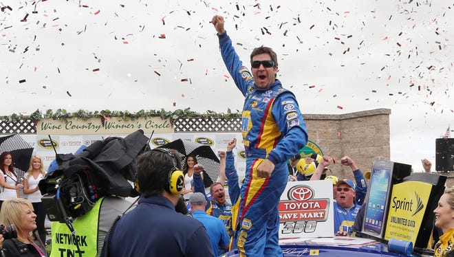 Truex Jr. celebrates in victory lane after winning the NASCAR Sprint Cup Series Toyota/Save Mart 350 at Sonoma Raceway on June 23, 2013 in Sonoma, California.