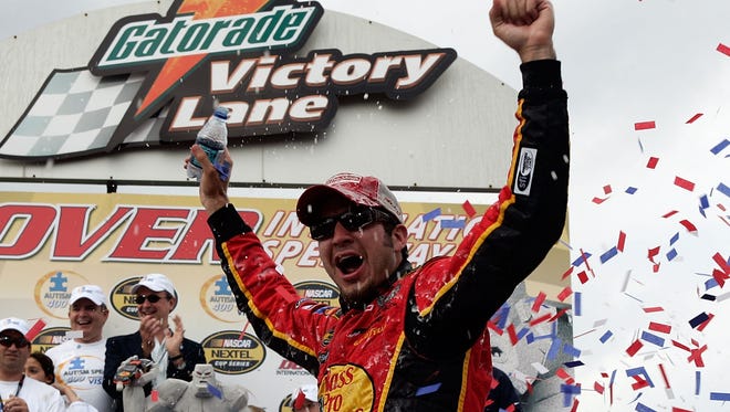 Martin Truex Jr. celebrates after winning the NASCAR Nextel Cup Series Autism Speaks 400 on June 4, 2007 at Dover Downs International Speedway in Dover, Delaware.
