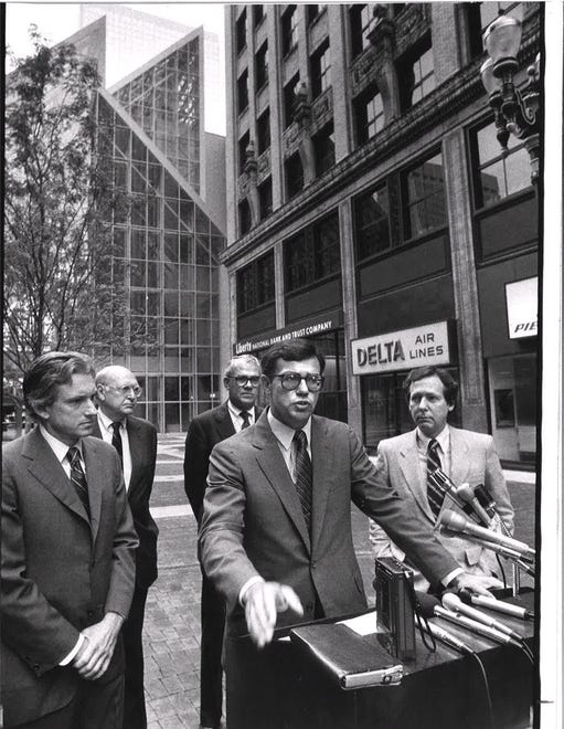 J. David Grissom, center, with Mayor Harvey Sloane, left, then-Judge-Executive Mitch McConnell, right, and civic leaders Gordon Davidson and A. Steve Miles in the background.