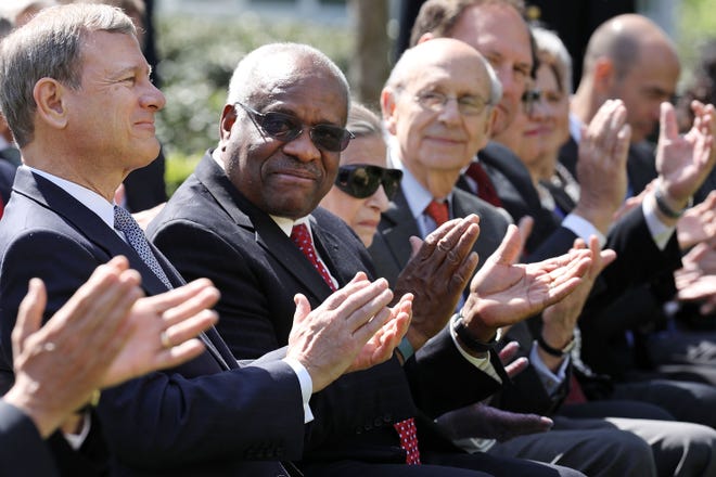 (L-R) U.S. Supreme Court Chief Justice John Roberts and associate justices Clarence Thomas, Ruth Bader Ginsburg, Stephen Breyer and Samuel Alito attend the ceremony where Judge Neil Gorsuch takes the judicial oath during a ceremony in the Rose Garden at the White House April 10, 2017 in Washington, DC. Earlier in the day Gorsuch, 49, was sworn in as the 113th Associate Justice in a private ceremony at the Supreme Court.